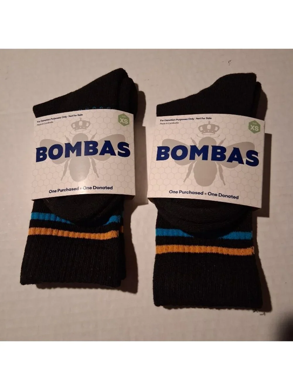 Bombas XS Black Socks With Blue & Yellow Stripes Cushioned Footbed Arch Support